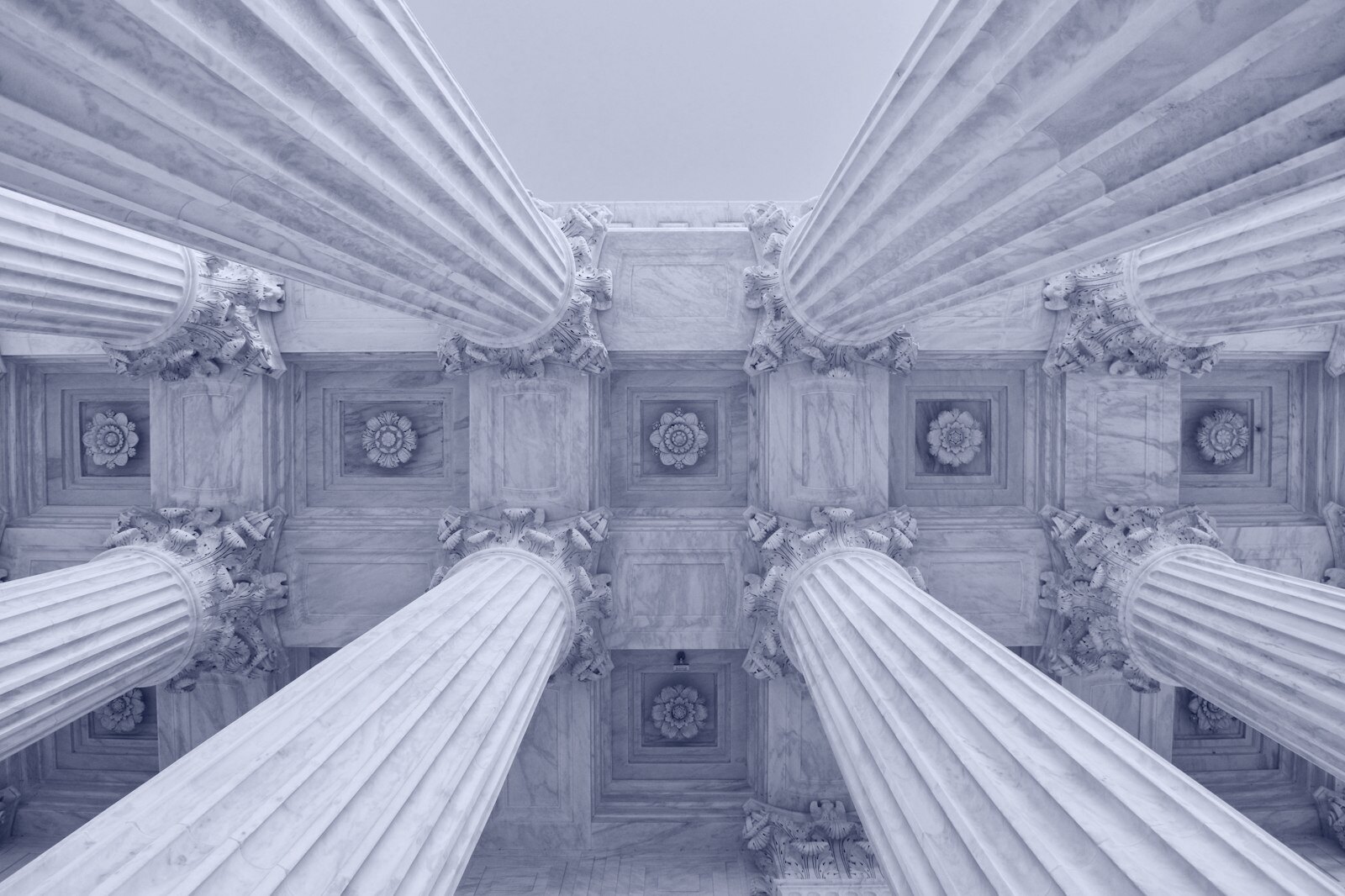 gray stone columns worm's-eye view photo